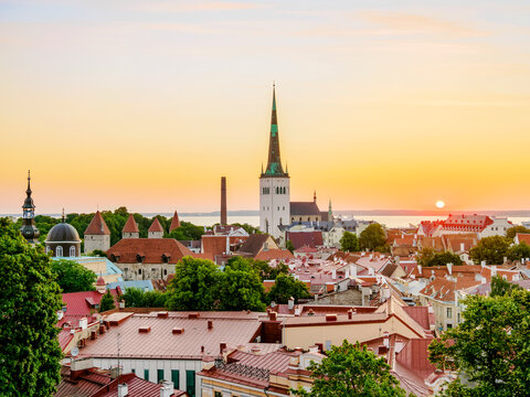 View over the Old Town towards St. Olaf's Church at sunrise, UNESCO World Heritage Site, Tallinn, Estonia
