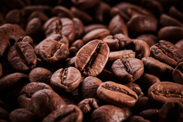 Roasted coffee beans macro close up background