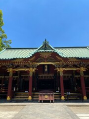 Fototapeta premium Beautiful pagoda design of traditional architecture, Japanese shrine in Tokyo Nezu, year 2022 June 28th 