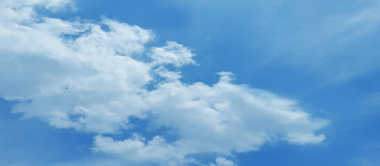 Beautiful bright and fresh blue sky background with clouds cape, Abstract watercolor painted cloudy blue sky background for wallpaper and creative design.