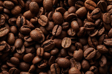 Roasted coffee beans macro close up background