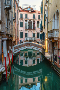 Reflections of houses and bridge in the canal, Sestiere San Marco, Venice, UNESCO World Heritage Site, Veneto, Italy