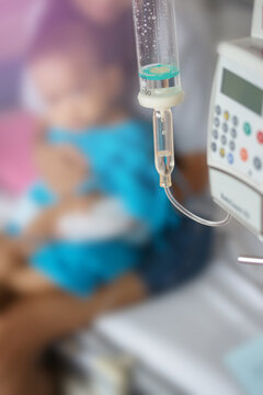 Close up saline solution drip and infusion pump