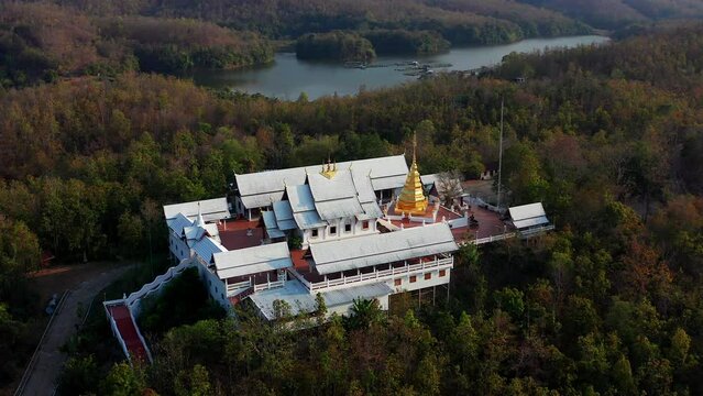 Wat Phrathat Pu Jae buddha and Huai Mae Toek lake in Phrae province, Thailand