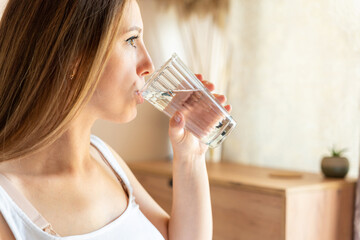 Pregnant drink water. Beautiful pregnancy drinking water. Happy pregnant lady holding glass of...
