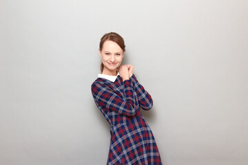 Obraz premium Portrait of happy young woman smiling cheerfully