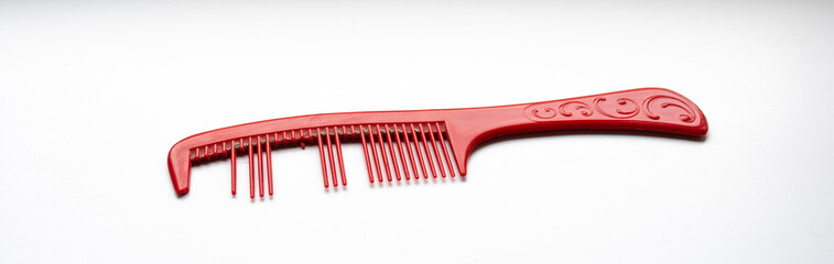 unusable hairbrush on white background