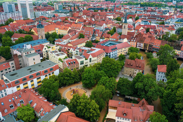 Fototapeta na wymiar Aerial view of the historic center of Erfurt old city from above with old houses , bridge and churches