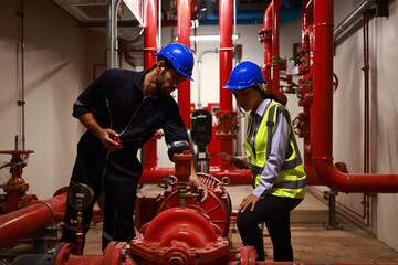 System engineer and Technician check fire Extinguishing System Piping and Pump - obrazy, fototapety, plakaty