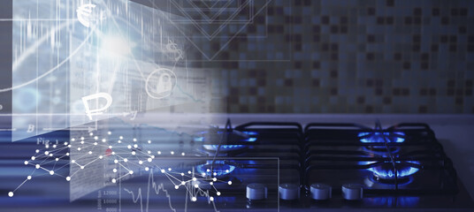  Flames of natural gas stove boiling water in a blue kettle at home. Built-in gas panel. The kettle...