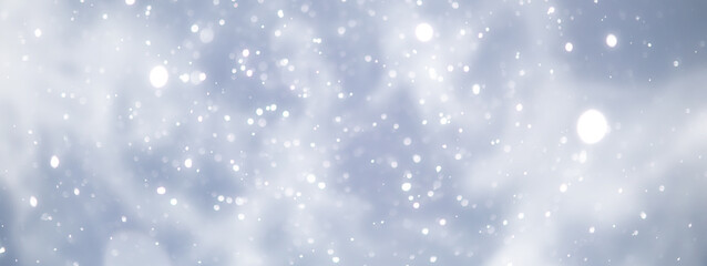 Fototapeta premium blue snowfall bokeh background, abstract snowflake background on blurred abstract blue