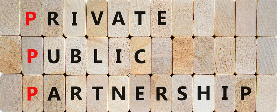 PPP private public partnership symbol. Concept words PPP private public partnership on wooden blocks on a beautiful wooden background. Business PPP private public partnership concept. Copy space