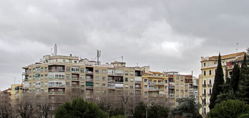 Random buildings during a cloudy day of winter in Granda.  