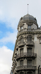 Fototapeta na wymiar Corner facade of the Old Colón Hotel or La Paz building in granada, Spain.