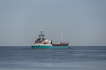 MARITIME TRANSPORT - A ship with a load is sailing on the sea