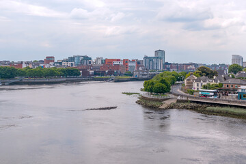 Beautiful Limerick urban cityscape over the river Shannon viewed from King John's Castle