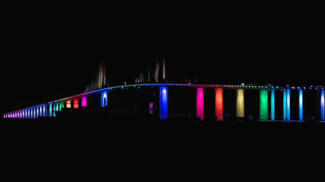 Pride rainbow colors light up the bridge