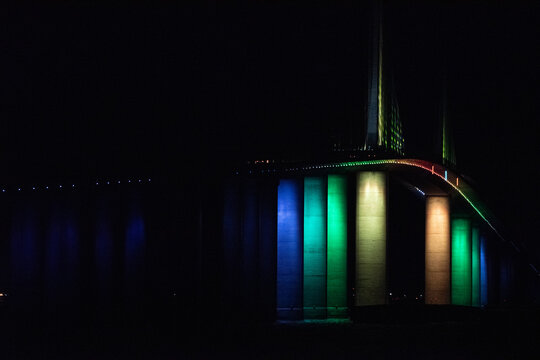 Bridge lights transition form Pride to transgender flag colors