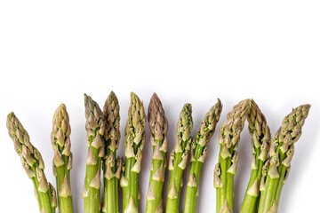 Fresh green asparagus isolated on white background as package design element. Heap, set, group of asparagus. Top view, copy space, space for text.