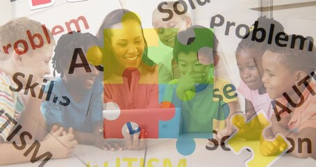 Animation of puzzle and autism texts over female teacher and diverse pupils at school - Powered by Adobe