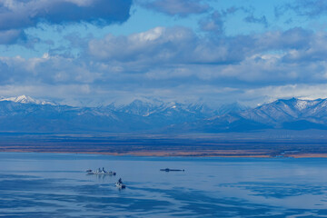 Obraz na płótnie Canvas Avacha Bay with warships and a submarine. Kamchatka