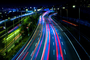 Fototapeta na wymiar Night view of traffic entering Barcelona, traces of cars.