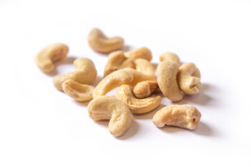 cashew nuts lie on a white background