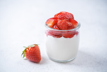 Greek yogurt strawberry parfait in a jar