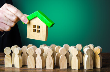 Affordable mortgage loan to buy housing. A government official hands over housing property....