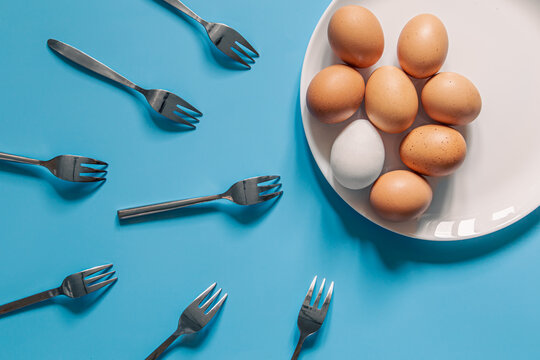 Eggs and forks, flat lay, oocyte fertilization, pregnancy, conception concept.