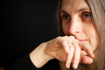 Wisdom and understanding. A portrait of a mature woman in a candid moment of compassion and...