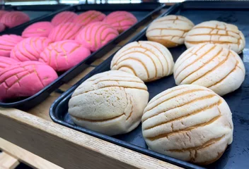 Fotobehang Mexican Pan Dulce (sweet bread) for sale at a bakery store © Adriana