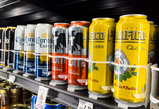 Sacramento, CA, USA June 28th 2022 Tin Cans of assorted mexican beers (tecate, corona and Pacifico brands) for sale at a local supermarket refrigerated shelf