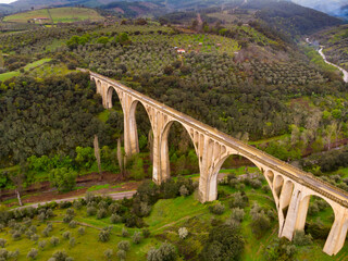 Fototapeta na wymiar Drone photo of Viaduct of Guadalupe between two steep mountain ranges. Extremadura, Spain.