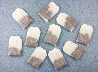 Tea bags on a blue background.Tea in disposable tea bags. Tea is on the table.