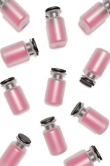 Glass bottles with pink content and black rubber plug