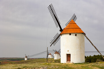 Fototapeta na wymiar Row of reconstructed windmills of Mota del Cuervo, province of Cuenca, Spain.