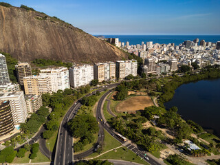 Aerial view of Rodrigo de Freitas Lagoon, south zone of Rio de Janeiro, Brazil. In the background, the beaches of Ipanema and Leblon and Morro Dois Irm&atilde;os. Sunny day. Buildings around. Drone photo