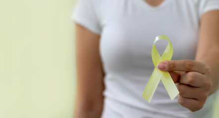 Yellow ribbon. Yellow July, Bone Cancer Awareness Month and Viral Hepatitis