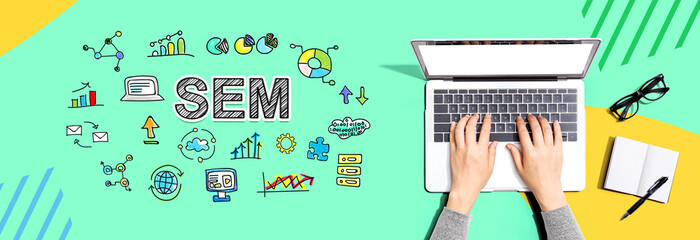 SEM with person using a laptop computer