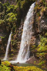 Fototapeta na wymiar Big waterfall at the cannyon