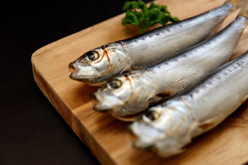 Squid that is the ingredient for multiple freshly caught fish dishes on the table
