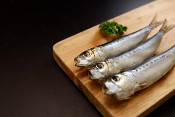 Squid that is the ingredient for multiple freshly caught fish dishes on the table
