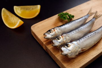 Squid that is the ingredient for multiple freshly caught fish dishes on the table
