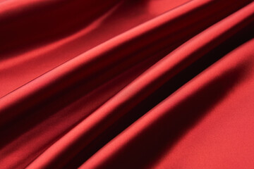 赤い綺麗なサテン布のドレープ
