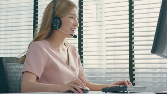 Asian beautiful business woman call center working in office workplace