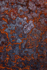 Dark blue background with red rust