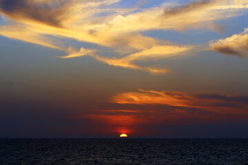 Fototapeta premium Colorful sunset at the end of the day.
