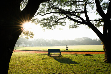 Silhouette of morning routine at nearest park in the town