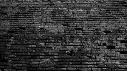 black square brick retro background wall rough texture architecture structure.